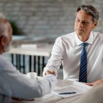 Disabled person visiting lawyers office to discuss ChatGPT ERISA limitations